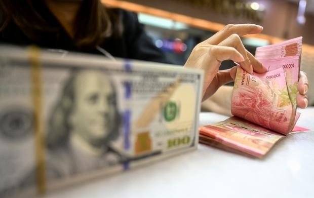 Nilai Tukar Rupiah Melemah terhadap Dollar As